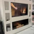 Foco One 1500 Media Wall Einbau-Bioethanol Kamin mit schwarzem Rahmen und Sicherheitsglas.